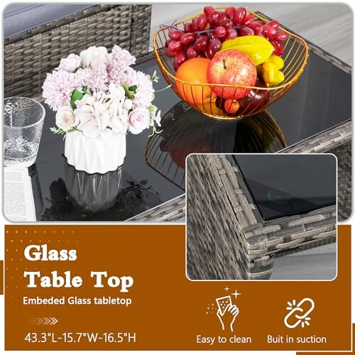 Glass table top with fruit bowl and flowers, easy to clean feature.