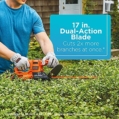 Person trimming hedge with 17-inch dual-action blade trimmer.