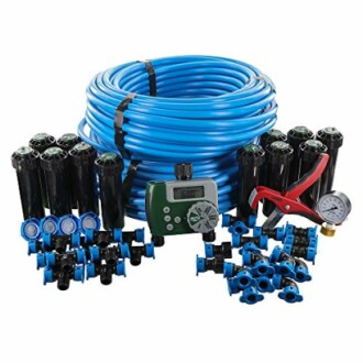 Irrigation system kit with hose, sprinklers, and timer.