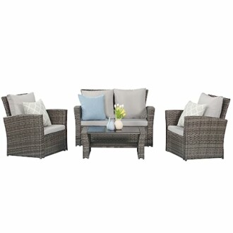 Outdoor patio furniture set with chairs, loveseat, and table.