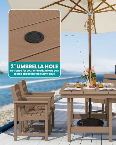 Outdoor patio table with umbrella and chairs by the beach.